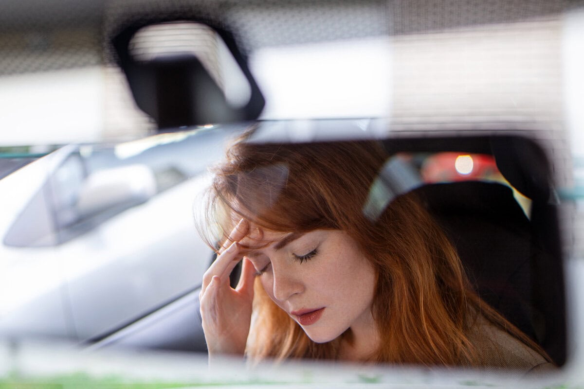 beautiful upset woman sitting automobile crying breakup sadness scaled